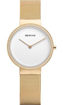 Flache Bering Uhr mit Milanaise Armband und kleinen Steinchen auf der Lünete